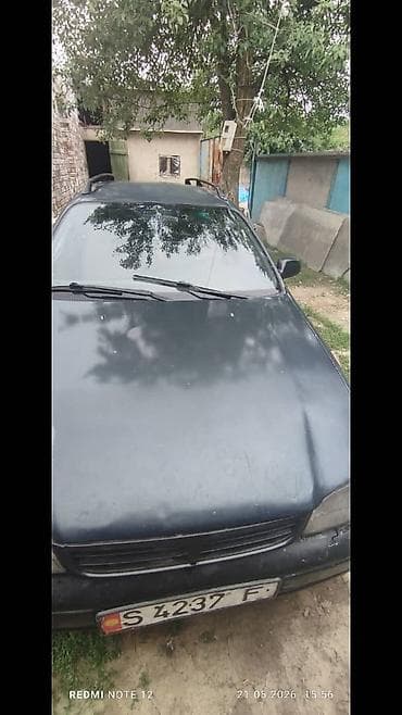 аудио касета: Toyota Carina E: 1994 г., 1.6 л, Механика, Бензин, Универсал — 2