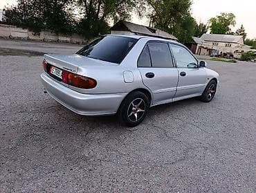 Mitsubishi Lancer: 1992 г., 1.6 л, Механика, Бензин, Седан