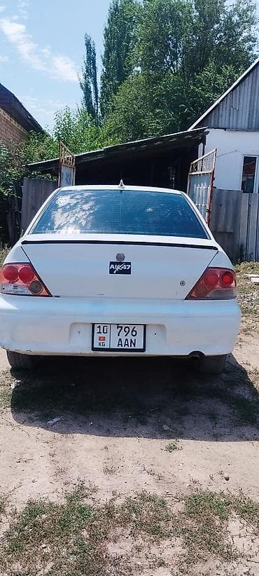 Транспорт: Mitsubishi Lancer: 2000 г., 1.5 л, Механика, Бензин, Седан — 6