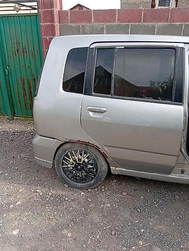 Nissan Cube: 1998 г., 1.4 л, Автомат, Хэтчбэк