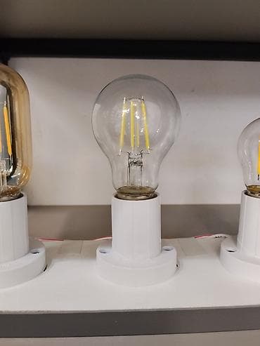Лампочки: LED-лампа с прозрачной колбой форм‑фактора A60 (классическая «груша») — 1