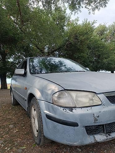 Продажа авто: Mazda 323: 2000 г., 1.8 л, Механика, Бензин, Хэтчбэк — 7