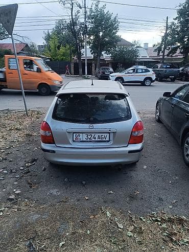 Mazda 323: 1999 г., 1.6 л, Автомат, Бензин, Хэтчбэк — 2