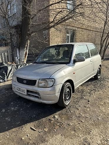 matiz 2009: Daihatsu Cuore: 2002 г., 1 л, Механика, Бензин, Хэтчбэк — 2