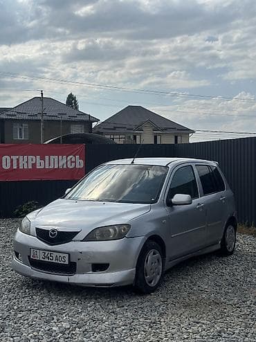 Mazda Demio: 2004 г., 1.3 л, Автомат, Газ, Хэтчбэк — 2