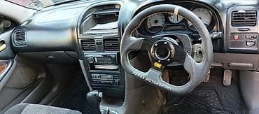 жак бу: Продаётся универсал с правым рулём, Toyota caldina чёрный цвет — 2