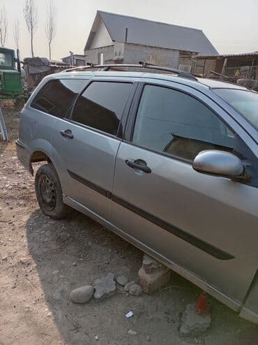 домкрать: Ford Focus: 2002 г., 0.8 л, Механика, Бензиновая, Универсал — 3