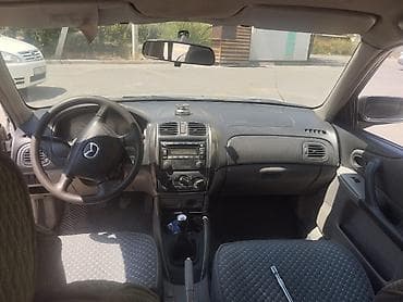 буксир: Mazda 323: 2003 г., Механика, Бензин, Универсал — 6
