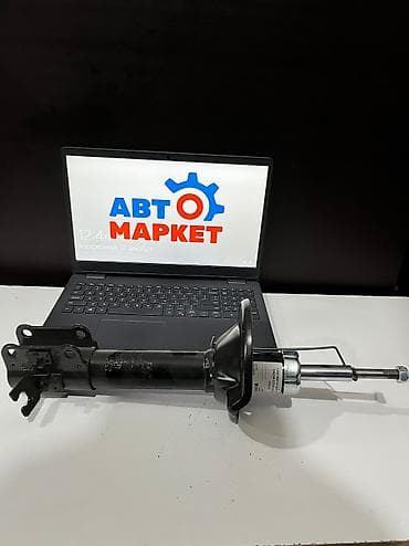 mazda: Задний амортизатор Mazda 1994 г., Новый — 1