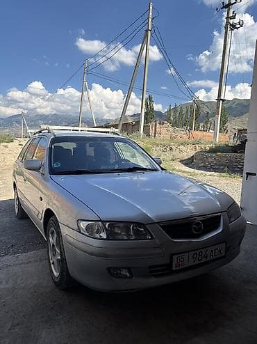 audi q4: Mazda Capella: 2001 г., 2 л, Механика, Бензин, Универсал — 1