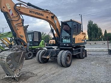 экскватор 145: Экскаватор, Hyundai, Колесный — 4