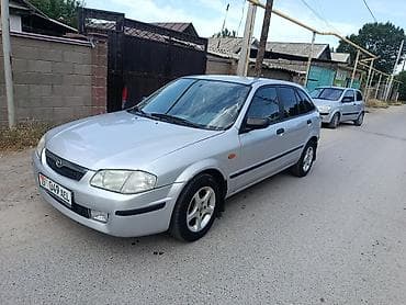 mazda demio капот: Mazda 323: 2000 г., 1.6 л, Механика, Бензин, Хэтчбэк — 3
