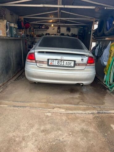 домкрат для машины: Mazda 626: 1993 г., 1.9 л, Механика, Бензин, Хетчбек — 3
