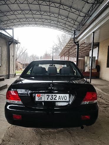 Mitsubishi Lancer: 2003 г., 1.6 л, Механика, Бензин, Седан