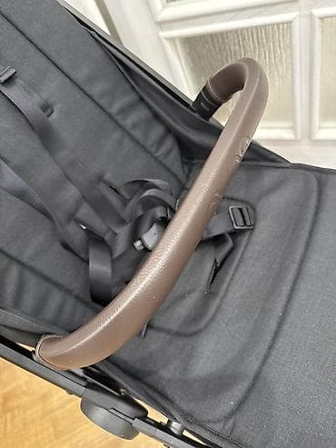 Игровые комплексы: Прогулочная коляска Nuna (черная) - Компактная легкая прогулочная — 7