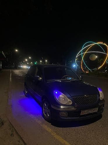 geely galaxy e5: Хэтчбек компакт‑класса, темно‑синего цвета, на грузинских номерах 01 — 2