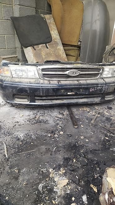 Бампер Mazda