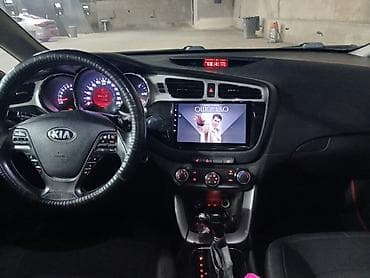 Kia Ceed: 2014 г., 1.6 л, Автомат, Бензин, Универсал — 7