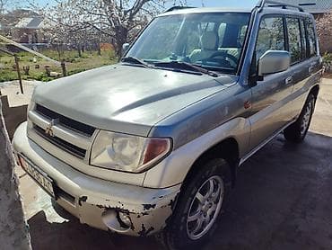 matiz 2009: Mitsubishi Pajero iO: 2002 г., 1.8 л, Ручные, Бензин, Внедорожник — 1