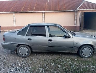 mini kuper: Daewoo Nexia: 1995 г., Седан — 3
