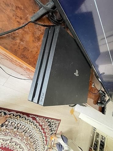 PlayStation 4 Pro (CUH-7xxx) — мощная домашняя игровая консоль с