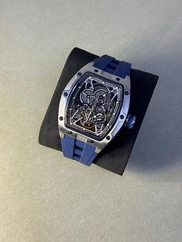 Часы в корпусе бочкообразной формы с открытым скелетонизированным — 1