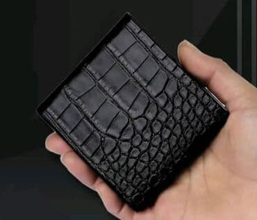 Портсигар с отделкой под крокодиловую кожу черного цвета. Подходит для