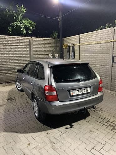 suzuki splash: Mazda 323: 2002 г., 1.6 л, Автомат, Бензин, Универсал — 2