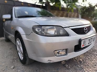 Mazda 323: 2003 г., 2 л, Кол менен иштөөчү, Газ, Хетчбек — 3