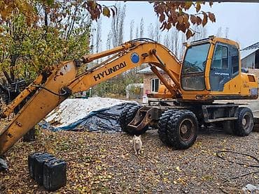 Экскаватор, Hyundai, 2001 г., Колесный