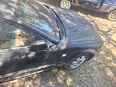 Daewoo Magnus: 2000 г., 2 л, Кол менен иштөөчү, Бензин, Седан — 5