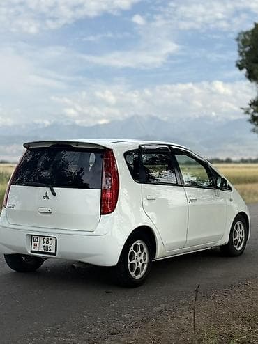 водиной туман: Mitsubishi Colt: 2004 г., 1.3 л, Вариатор, Бензин, Хэтчбэк — 7