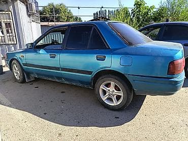 Транспорт: Mazda 323: 1991 г., 1.6 л, Механика, Бензин — 8