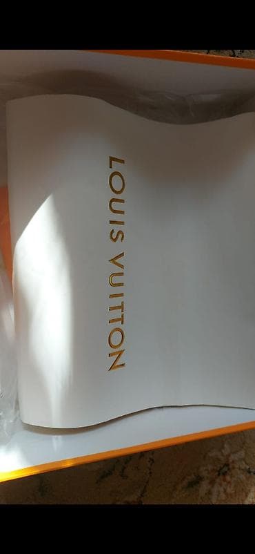 vuitton: Женские ботильоны на каблуке с монограммным принтом. - Модель — 4