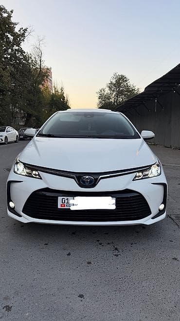 byd e2 2023: Toyota Corolla: 2020 г., Гибрид, Седан — 1