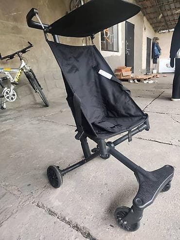 коляска летние: Компактная прогулочная коляска черного цвета с солнцезащитным — 2