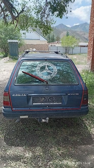 семиместный авто: Mercedes-Benz W124: 1992 г., 2.3 л, Механика, Бензин, Универсал — 3
