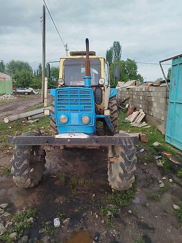 трактор 82 1: Трактор с навесным оборудованием Комплектация: - Колёсный трактор — 1