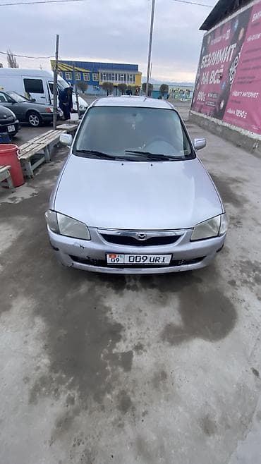 е39 e39: Mazda Familia: 1998 г., 1.6 л, Механика, Бензин, Универсал — 5