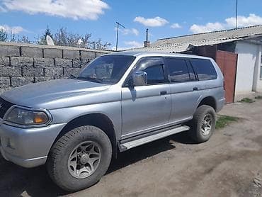 на панель: Mitsubishi Pajero Sport: 2000 г., Автомат, Внедорожник — 2