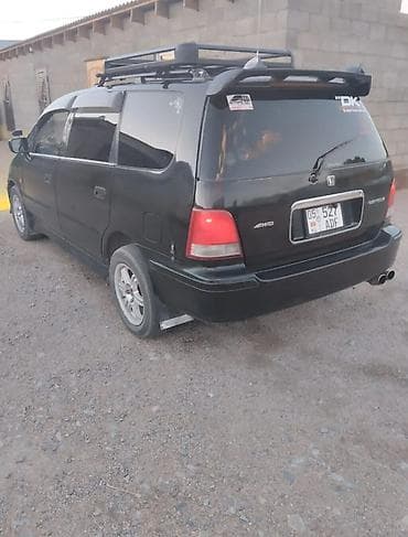 обмен на одиссей: Honda Odyssey: 1995 г., 2.3 л, Автомат, Бензин, Минивэн — 4