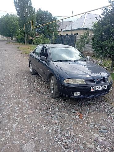 sorento 2019: Mitsubishi Carisma: 2002 г., Седан — 2