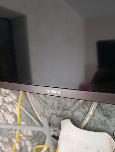 Телевизоры: Телевизор VASIN, диагональ ориентировочно 43–50". Тонкие рамки — 2