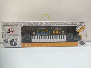 microsoft game consoles: Синтезатор детский с микрофоном и блоком питания — 1