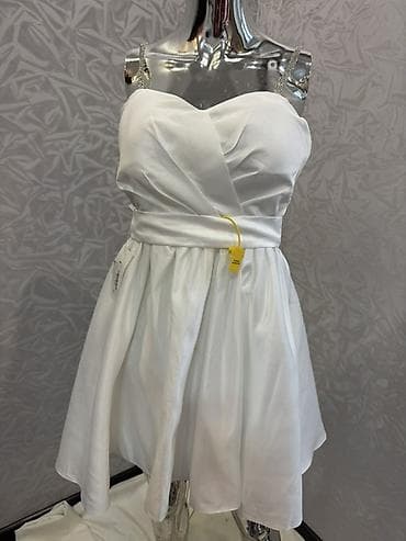 Платье-коктейль с корсетным лифом и пышной юбкой до колена. - Два