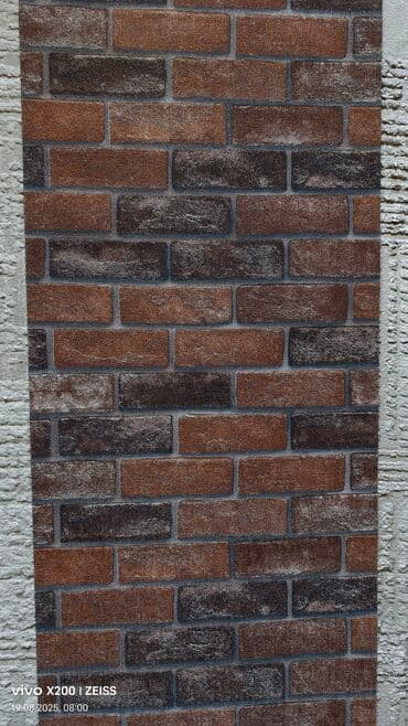 Обои с имитацией кирпичной кладки представляют собой долговечное и