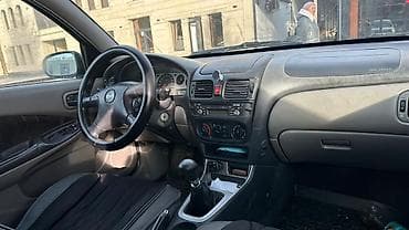 Nissan: Nissan Almera: 2002 г., 1.5 л, Механика, Бензин, Хэтчбэк — 2
