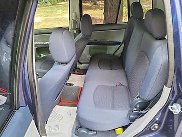 б в: Mazda Demio: 2004 г., 1.3 л, Автомат, Бензин, Хэтчбэк — 8