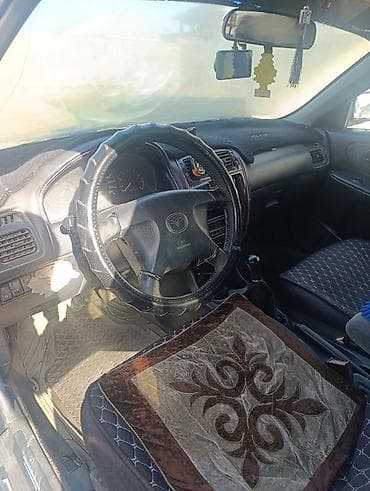 кочкор авто: Mazda 323: 1999 г., 1.8 л, Кол менен иштөөчү, Бензин, Седан — 4