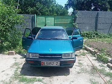 электр авто: Mazda 323: 1986 г., 1.5 л, Кол менен иштөөчү, Бензин, Седан — 3